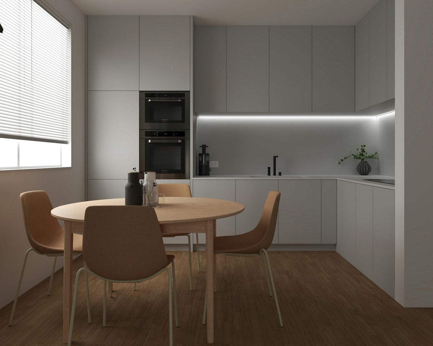 Cocina terminada con mesa junto a una ventana con luz natural